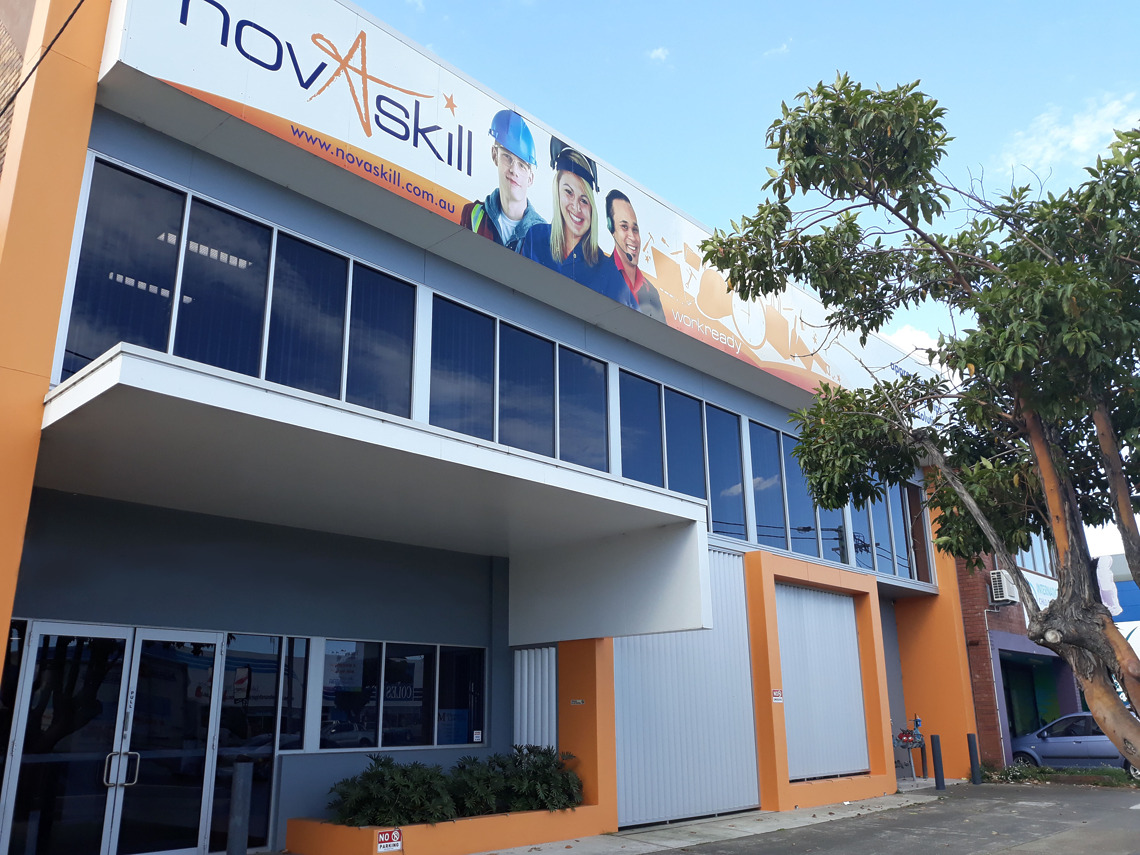 Exterior of the Novaskill building showing its branding and signage