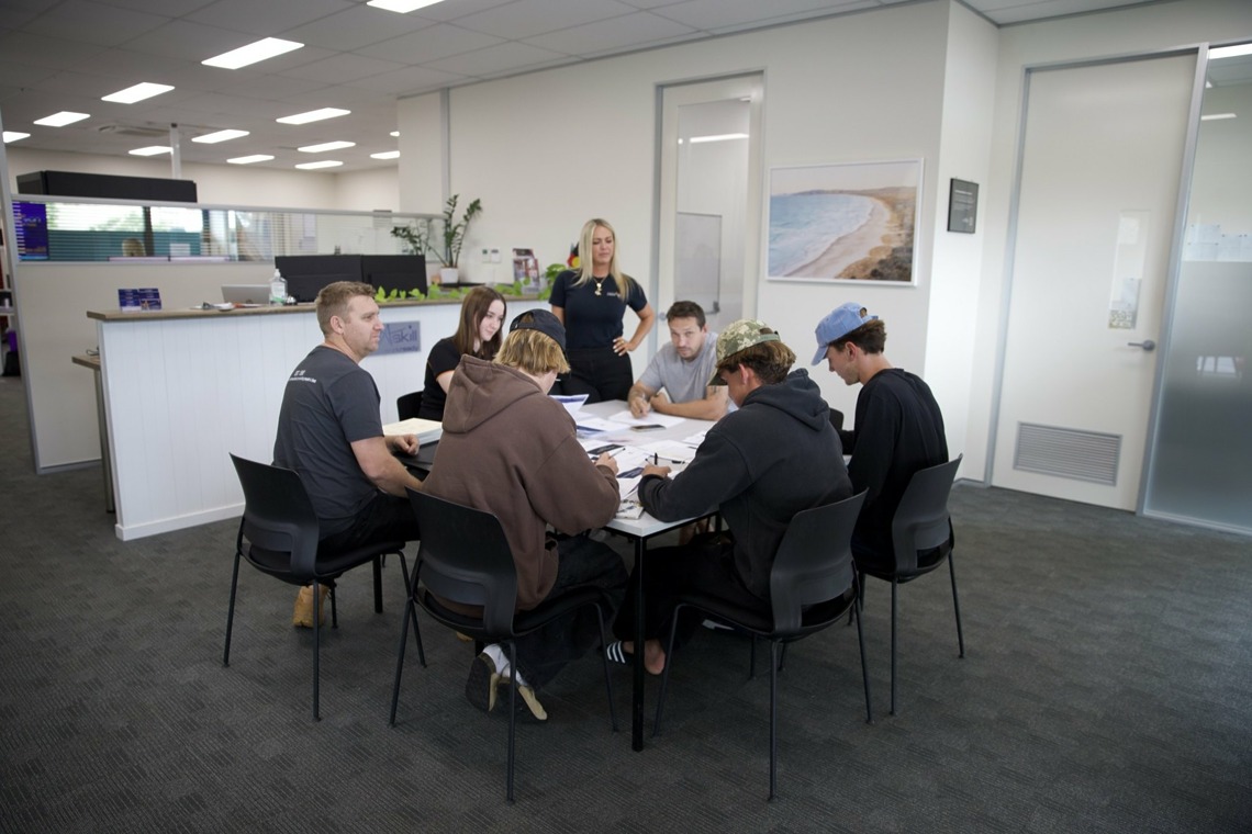 Novaskill team members in a training room