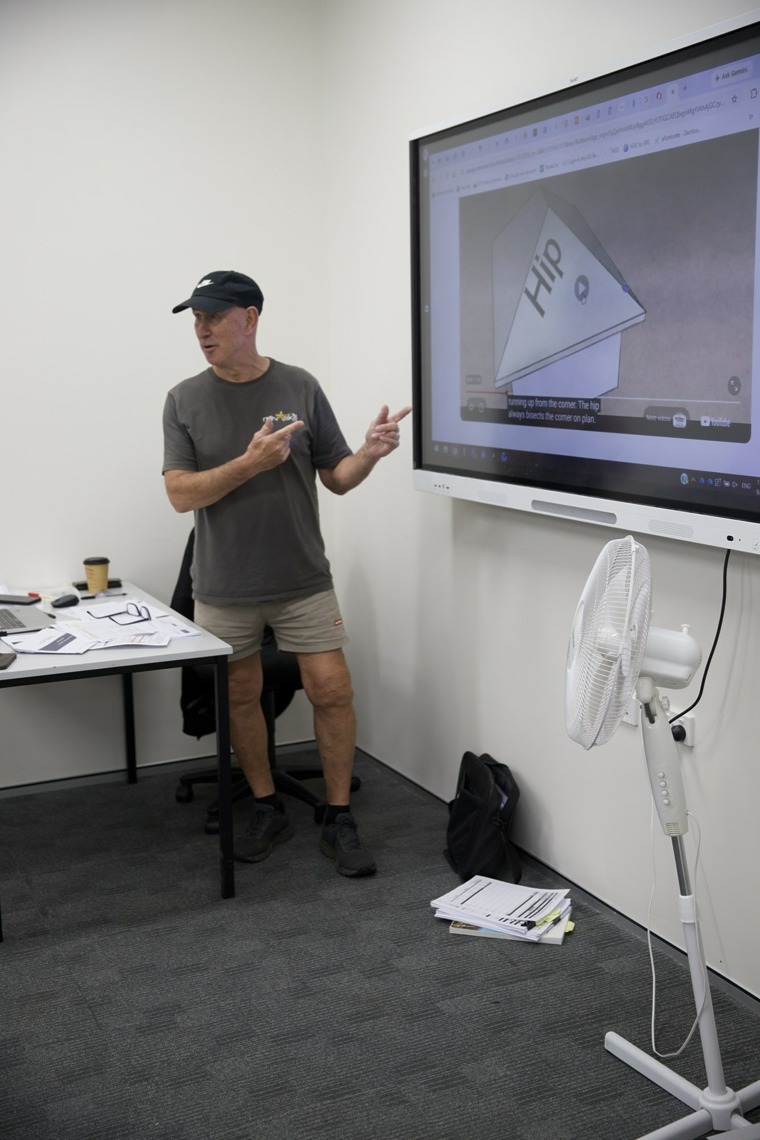 Novaskill trainer presenting learning material on a screen